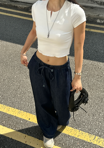 Yura Wavy Hem Baby Tee